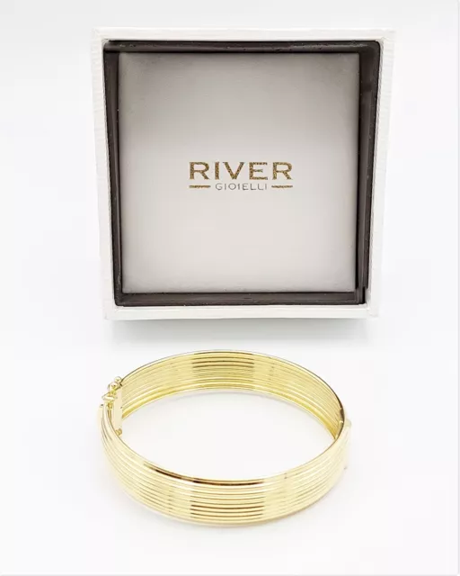 Women's 18kt Yellow Gold Wide Band Hard Bracelet Retractable closure.