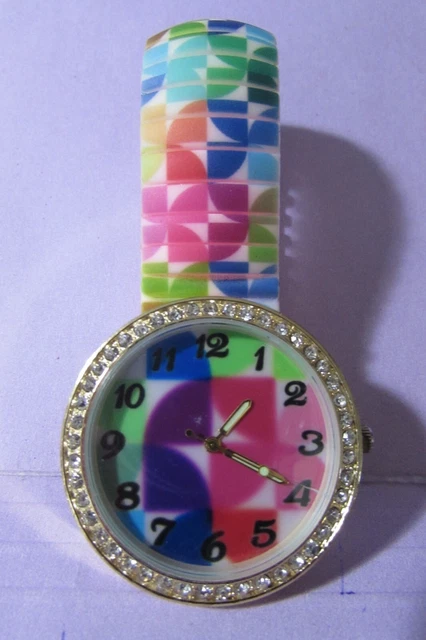 NEW/unworn multicolor wristwatch watch stainless steel back stretch plastic band