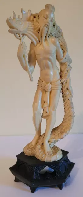 Vintage Carved Asian Man With Serpent Fish Figure On Stand-Figure Made Of Faux