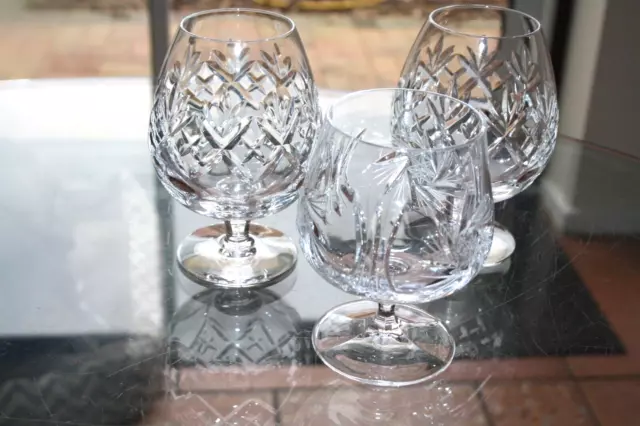 Set of three cut glass brandy glasses two Royal Doulton