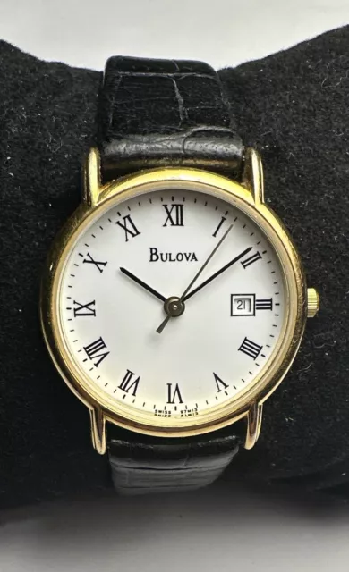 BULOVA  WOMEN'S WATCH- Swiss- 97M13 Date - Gold Tone Black Leather Band-New Batt