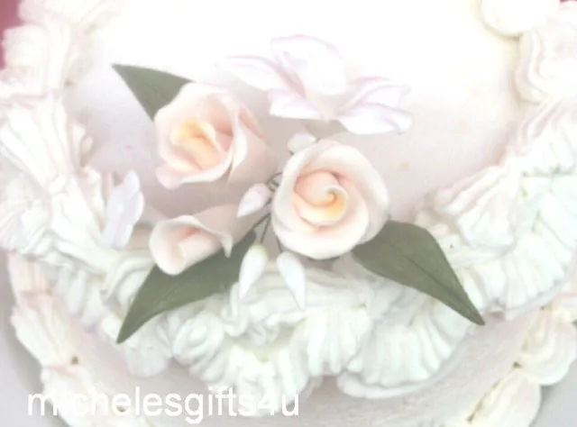 Pasta de goma de azúcar blanca orquídea marfil rosa y flores Stephanotis decoración de pasteles