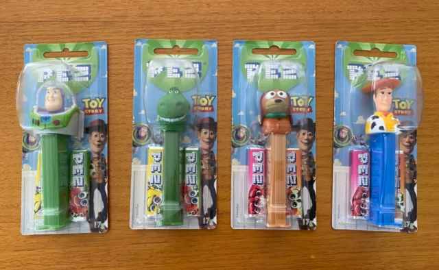 Pez Toy Story Set of 4 Pez Dispensers on Cards Woody Buzz Rex Slinky