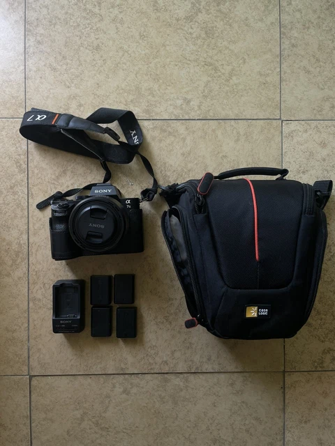 Sony A7 II 24.2 MP Digital Camera with 50mm Lens, 4 Batteries, & Extras