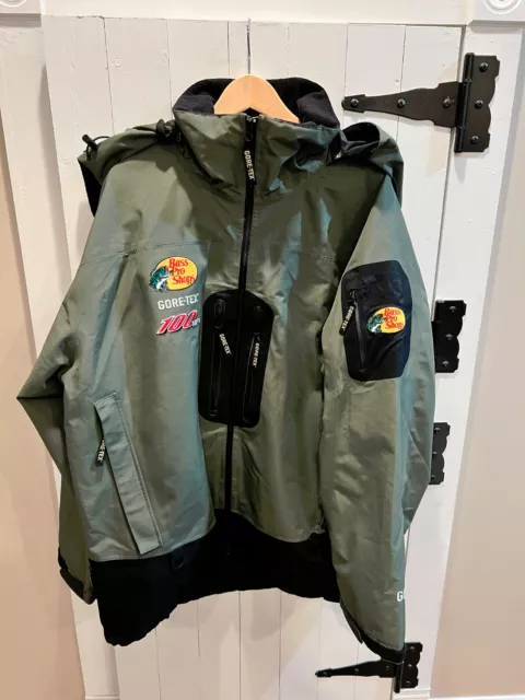 https://www.picclickimg.com/uLEAAOSwxh9lnD1W/BASS-PRO-SHOPS-Green-100MPH-GORE-TEX-RAIN-JACKET.webp