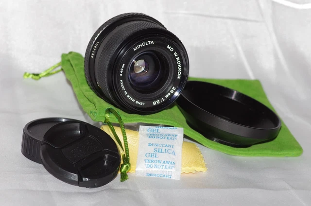 Objectif Grand Angle MINOLTA MD W.ROKKOR 28mm f/2,8 + HOUSSE/BOITE/HOOD/FILTRE
