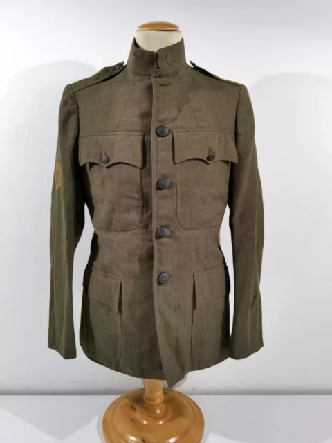 U.S. WWI Model 1917 tunic, belonged to a saddler in the 1st AEF Corps. One overs