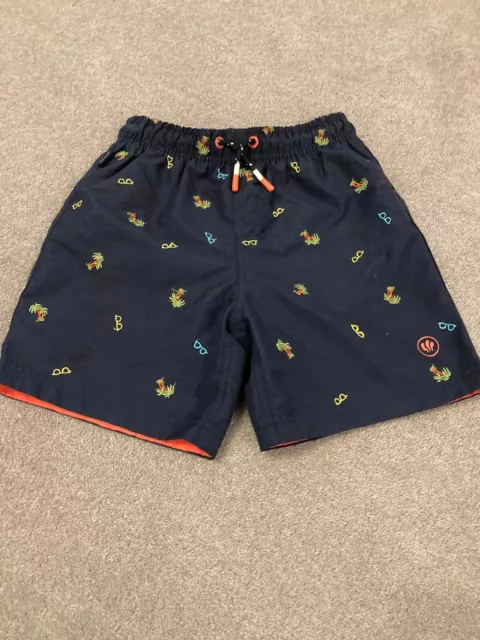 Jungen fettes Gesicht Schwimmshorts marineblaue Palmen und Sonnenbrille Alter 8-9