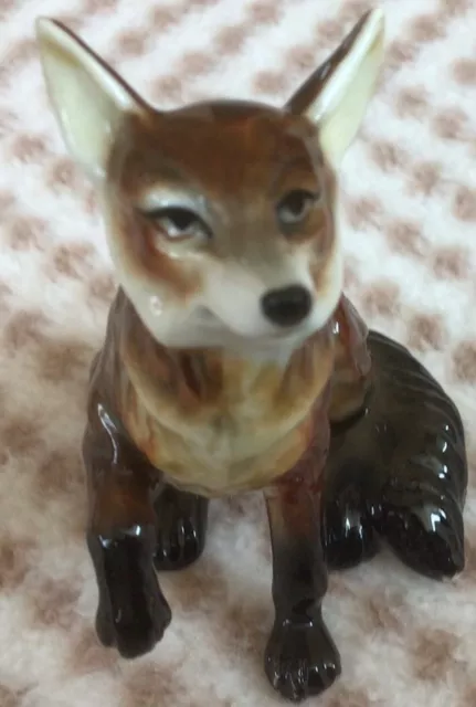 Sitting Fox Figure with Paw Up Napco