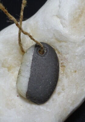 An Ancient Bi colour Stone Bead Pendant