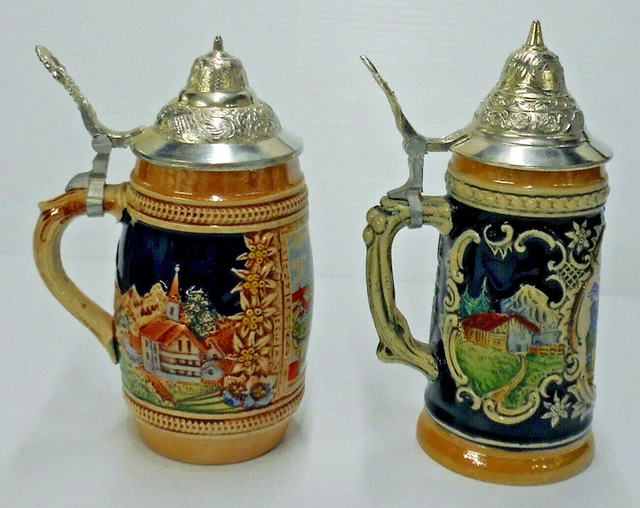 2 GERMAN BEER Steins With Lids marked DBGM. Dberammergau MUNCHEN