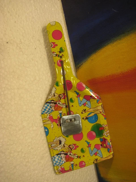 Litho Tin New Years Eve Paddle Noisemaker with Slightly Saucy Graphics