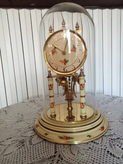 Orologio vintage da tavolo con campana in vetro anni  60