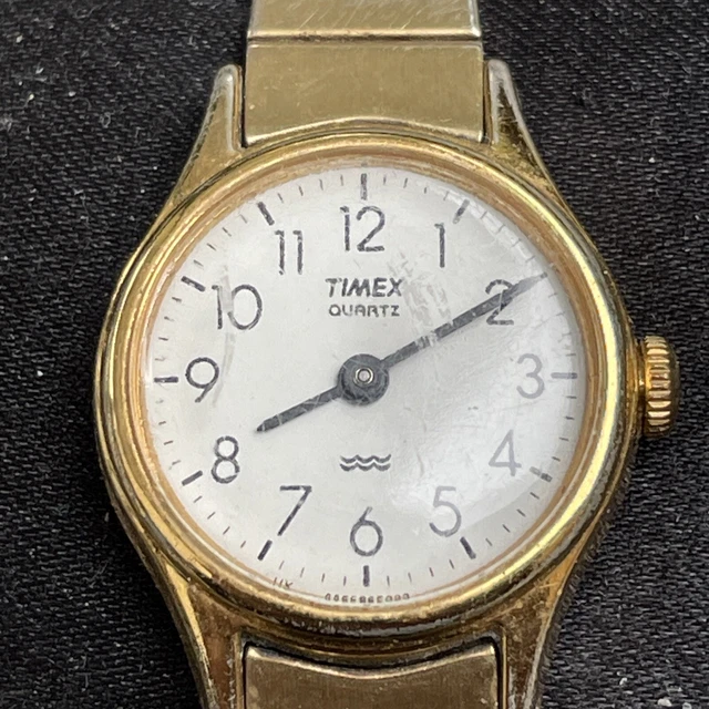 Ladies Timex stretch band gold watch