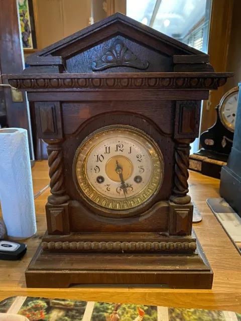 old wooden mantel clock