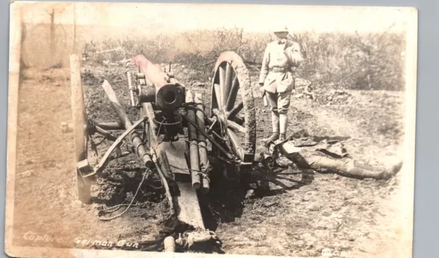 WW1 CAPTURED GERMAN CANNON real photo postcard rppc battlefield war soldier gun