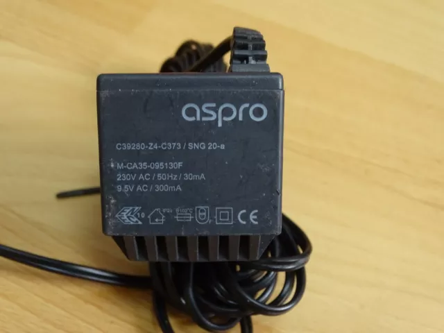 Adapter ASPRO SNG-20a C39280-Z4-C373 output: 9,5v 300mA   #51