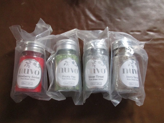 4 botellas de brillo de Tonic Studios