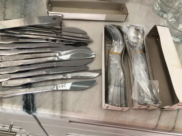 EASTERN Airlines silverware 12 spoons new, 12 forks new, 11 knives used, 1 serve