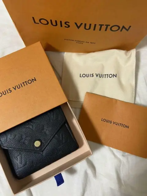 BNIB Amazing LOUIS VUITTON Bicolor Empreinte Leather Key Cle