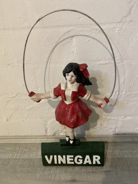 Vintage Vinegar Girl Door Stopper.