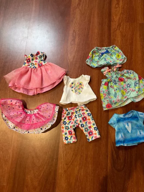 BABY ALIVE clothes 7 pieces, 4 tops 3 bottom all clean condition, genuine brand