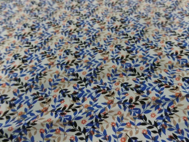 Tissu Coton popeline blanche imprimé liberty fleurs bleu et noir en 1.45m  large