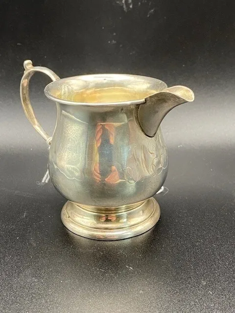 Silver cream jug, monogrammed. Birmingham 1924. 47.5g
