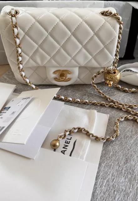 chanel mini with gold ball earrings