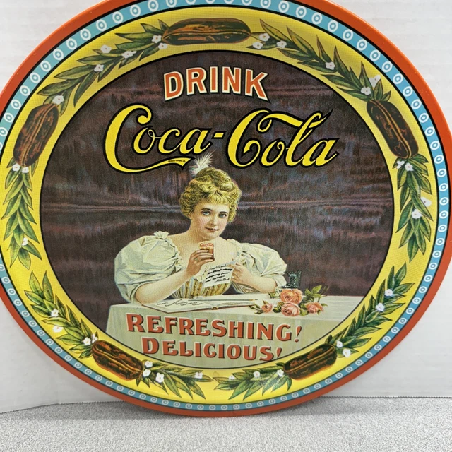 Coca cola plaque métal  delicious refreshing 35/25 cm