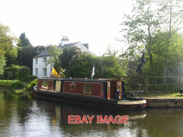 Photo  Boat Outside A House Narrowboat 'Kildare' Moored Outside A House At Pontn