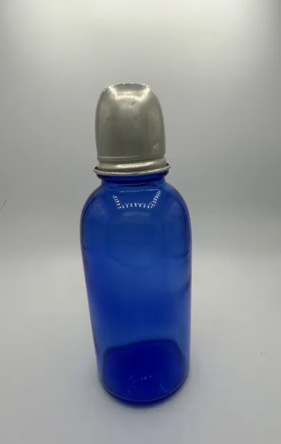 Scarce Vintage Cobolt Blue Bottle With Silver Dome Cap