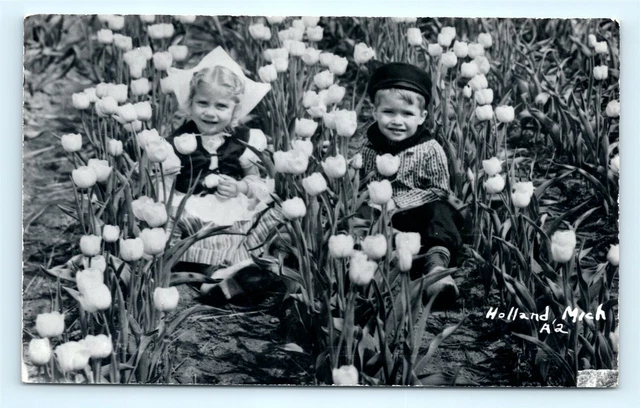 Postcard MI Holland Little Dutch Children in Tulip Field Real Photo RPPC H15