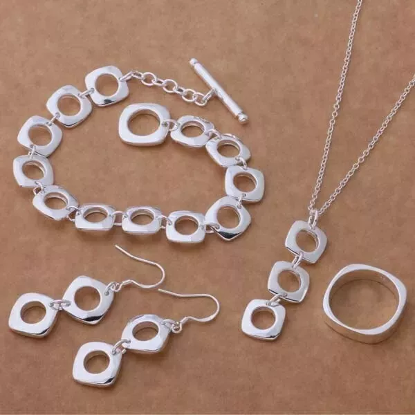 4 Tlg.Schmuck Set, Halskette mit Anhänger-Armband-Ring-Ohrringe in Silber.