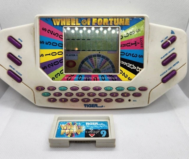 VINTAGE WHEEL OF Fortune Tiger Handheld Game With Cartridge 1995