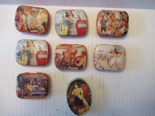 Lot of 8 Small Coca Cola Candy Tins Pill Boxes.