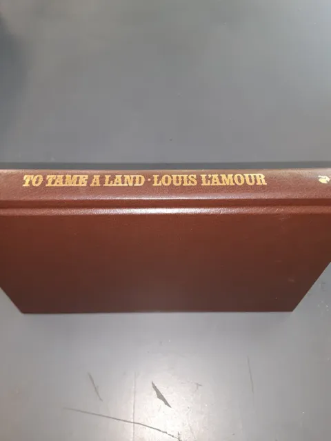1987 cowboy WESTERN Louis L'Amour Collection LEATHERETTE edition TO TAME A LAND