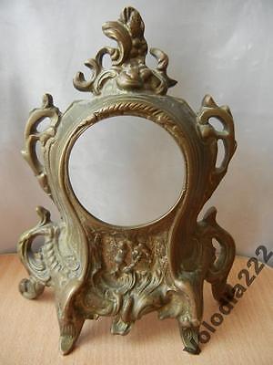 Vintage Figural The body clock. Bronze Brass