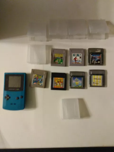 Nintendo Game Boy Color Handheld Game Console & 7 games with 6 cases