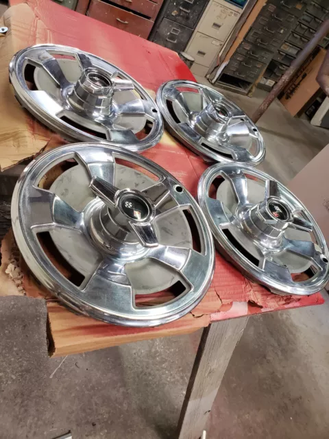 1966 Chevrolet Corvette Genuine GM original hubcaps set 4