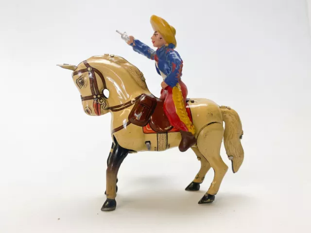 Köhler Blechspielzeug, Cowboy auf Pferd