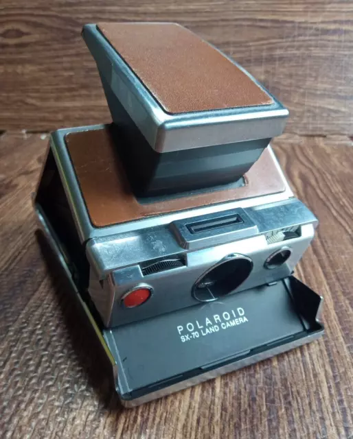 Cámara terrestre fotográfica instantánea Polaroid SX-70, plateada con bronceado - sin probar