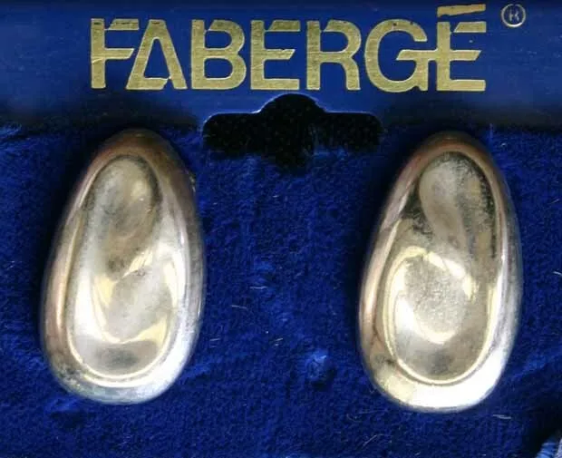 Faberge' Vintage Silver-tone Oval Pierced Earrings on the original card 7/8"