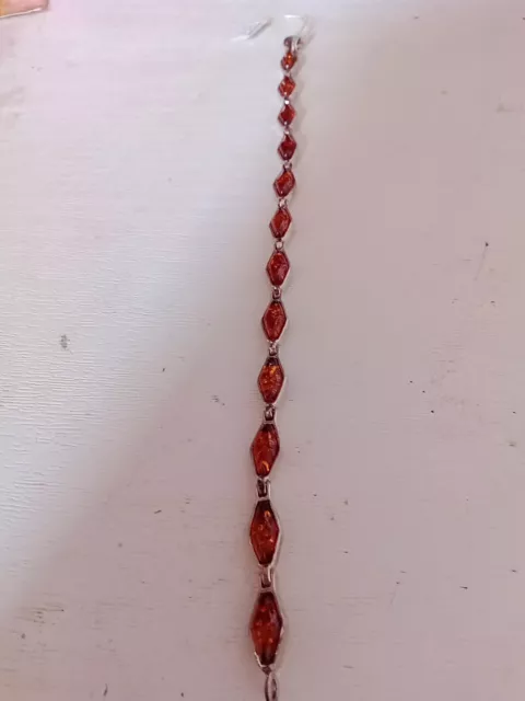 Beau bracelet en Argent 925  et Véritable Ambre miel