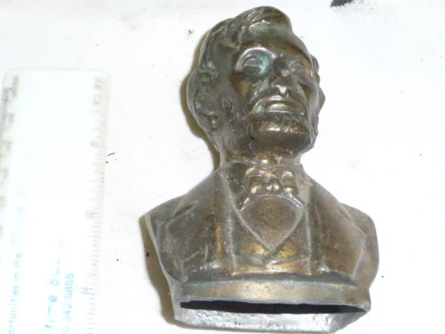 Abraham Lincoln bust ,heavy- brass ,very nicely detailed 4 INCHES HIGH