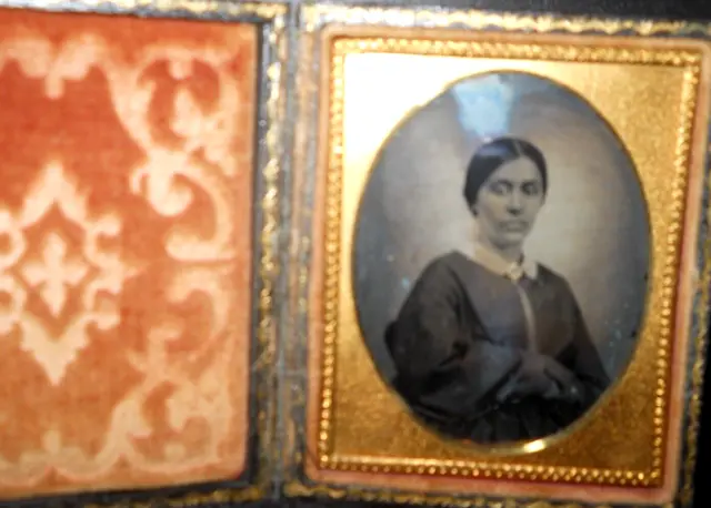 1/9th size Ambrotype of young lady in full case