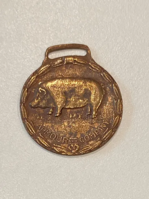 Armour and Company watch fob with PIG, Plant opening of 1925