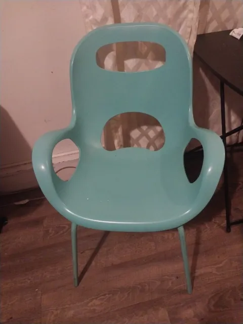 teal vintage plastic chair