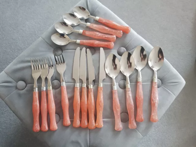 16 piece cutlery set with peach coloured handles