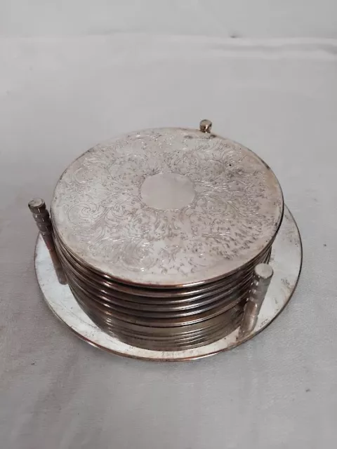 Vintage 7-piece coaster set silver plated with box
